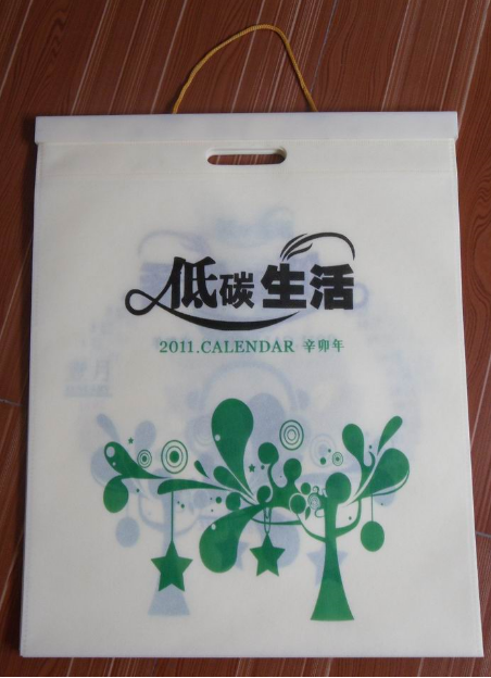 無紡布袋掛歷批發(fā)，無紡布掛歷訂做廠家